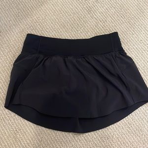 Black lululemon tennis skirt, size 2